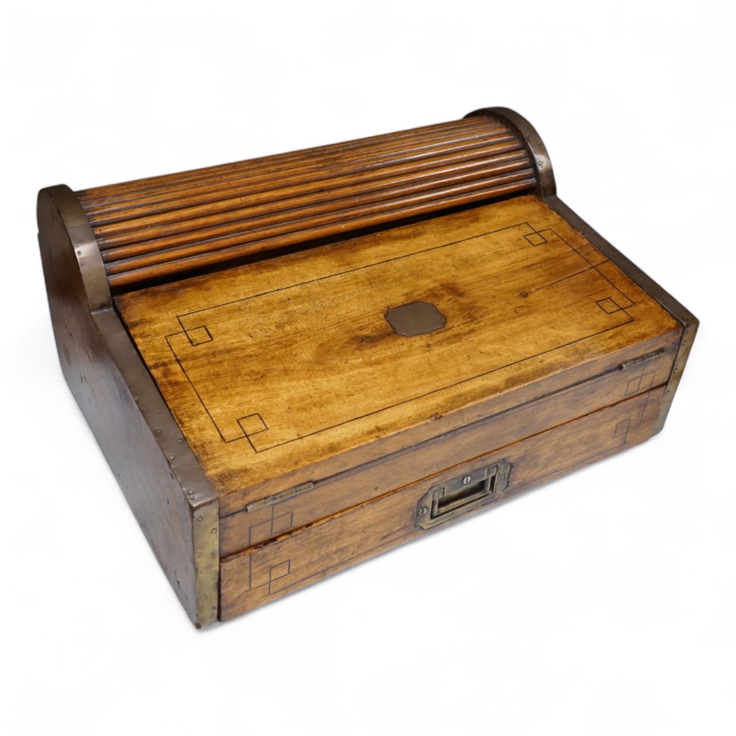 A Victorian Anglo-Indian brass mounted camphor wood campaign roll top writing box, with drawer. 12.5cm high x 35cm deep x 45.5cm wide.